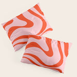 Modern Retro Liquid Swirl Abstract Pattern in Light Pink and Red Orange Pillow Sham Gallery Image 1