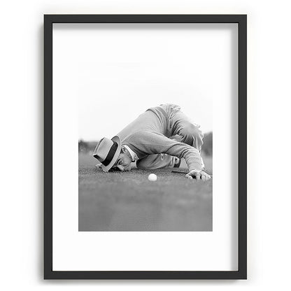 Eye to the ground on the 18th hole; golfing man eyes ball to measure distance to hole vintage black and white portrait photograph - photography - photographs poster Framed Art Print Gallery Image 84