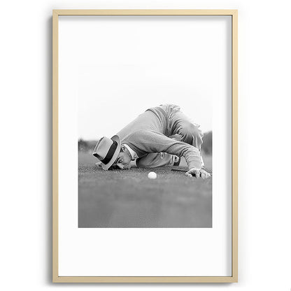 Eye to the ground on the 18th hole; golfing man eyes ball to measure distance to hole vintage black and white portrait photograph - photography - photographs poster Framed Art Print Gallery Image 102