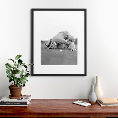 Eye to the ground on the 18th hole; golfing man eyes ball to measure distance to hole vintage black and white portrait photograph - photography - photographs poster Framed Art Print Gallery Image 48