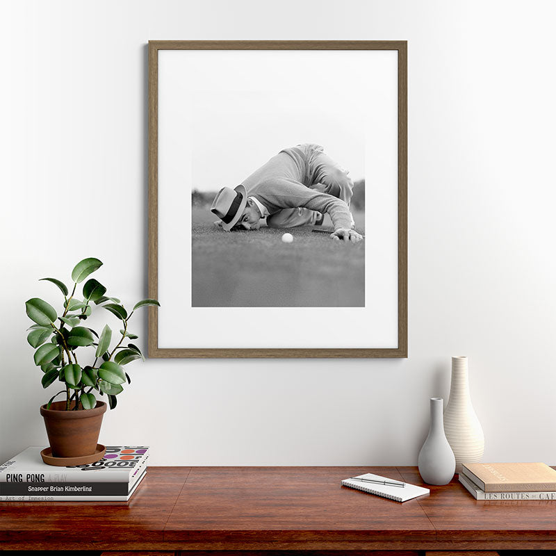 Eye to the ground on the 18th hole; golfing man eyes ball to measure distance to hole vintage black and white portrait photograph - photography - photographs poster Framed Art Print Gallery Image 58