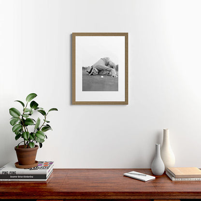 Eye to the ground on the 18th hole; golfing man eyes ball to measure distance to hole vintage black and white portrait photograph - photography - photographs poster Framed Art Print Gallery Image 54