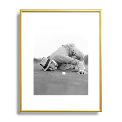 Eye to the ground on the 18th hole; golfing man eyes ball to measure distance to hole vintage black and white portrait photograph - photography - photographs poster Framed Art Print Gallery Image 120