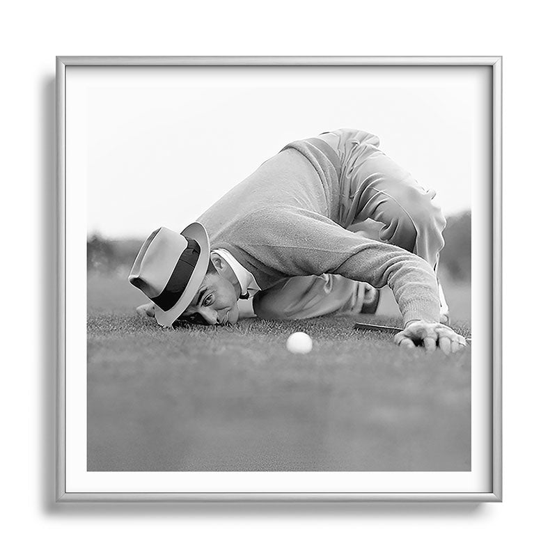 Eye to the ground on the 18th hole; golfing man eyes ball to measure distance to hole vintage black and white portrait photograph - photography - photographs poster Framed Art Print Gallery Image 140
