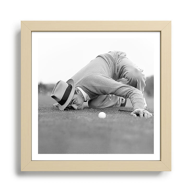 Eye to the ground on the 18th hole; golfing man eyes ball to measure distance to hole vintage black and white portrait photograph - photography - photographs poster Framed Art Print Gallery Image 24