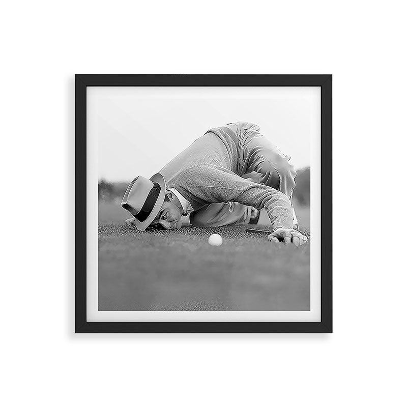 Eye to the ground on the 18th hole; golfing man eyes ball to measure distance to hole vintage black and white portrait photograph - photography - photographs poster Framed Art Print Gallery Image 7
