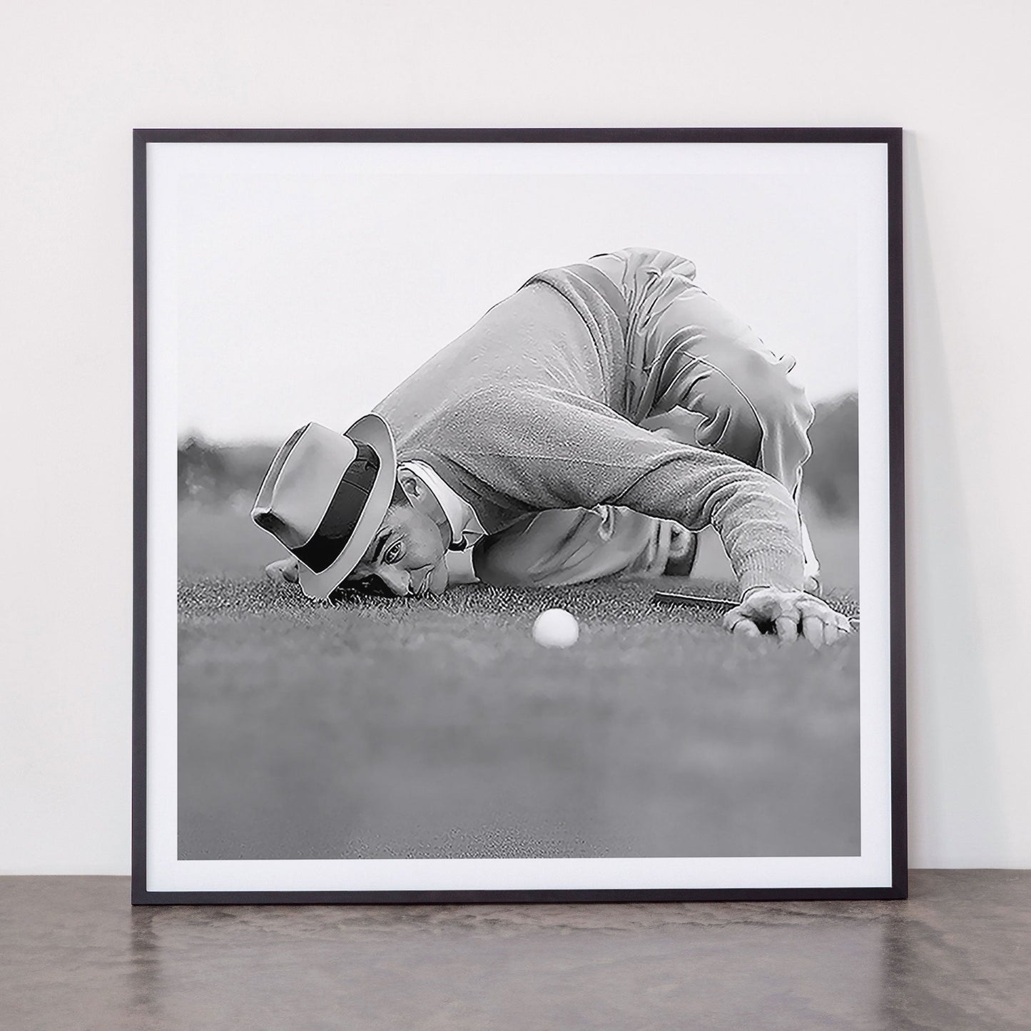 Eye to the ground on the 18th hole; golfing man eyes ball to measure distance to hole vintage black and white portrait photograph - photography - photographs poster Framed Art Print Gallery Image 11