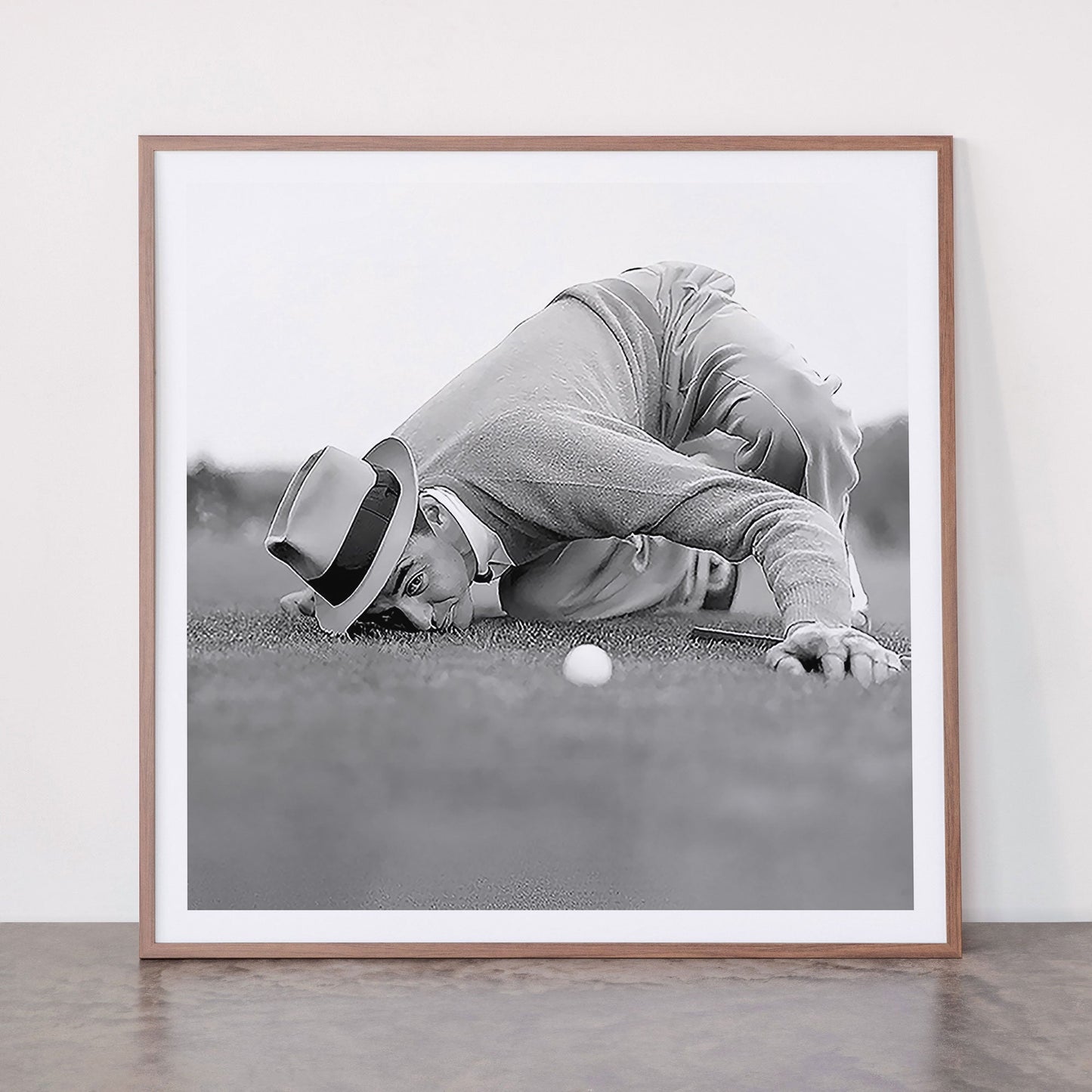 Eye to the ground on the 18th hole; golfing man eyes ball to measure distance to hole vintage black and white portrait photograph - photography - photographs poster Framed Art Print Gallery Image 21