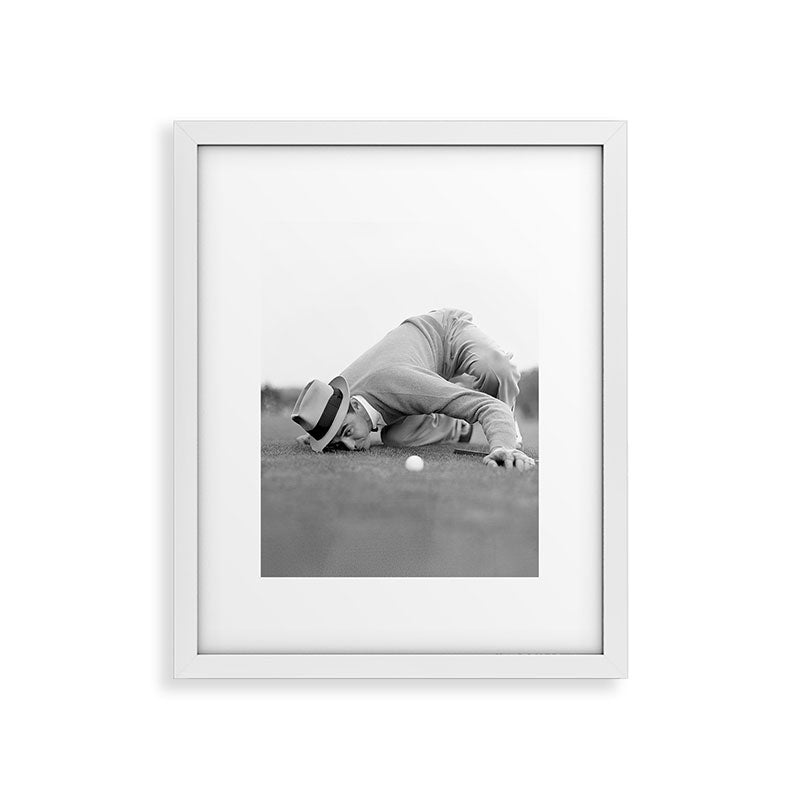 Eye to the ground on the 18th hole; golfing man eyes ball to measure distance to hole vintage black and white portrait photograph - photography - photographs poster Framed Art Print Gallery Image 34