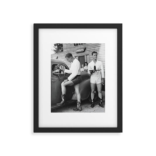Texas love, male drive-in car hops in shorts and cowboy boots at drive in tavern near Love Field Airport in Dallas vintage black and white photograph - photography - photographs Framed Art Print Gallery Image 1
